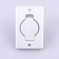 Plain white central vacuum inlet valve.